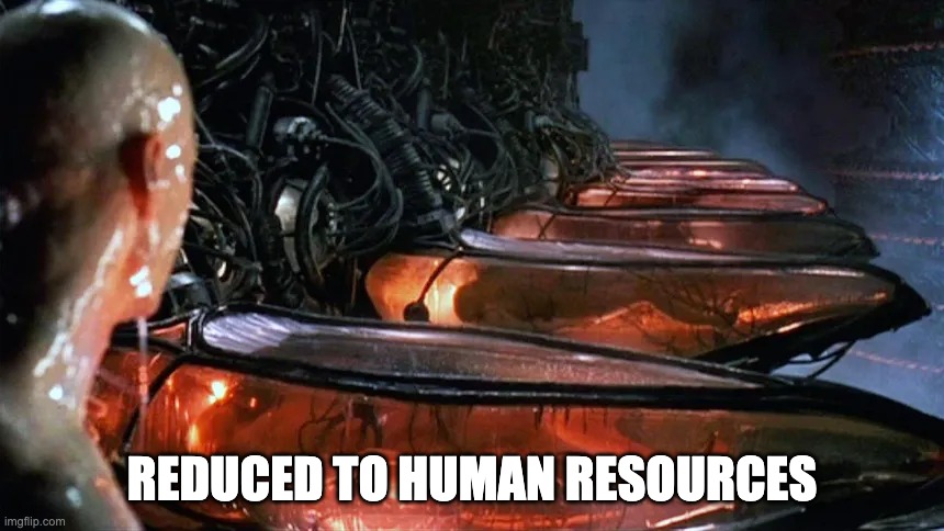 Real-world Neo from Matrix waking up and looking at rows of bathtubs filled with humans.